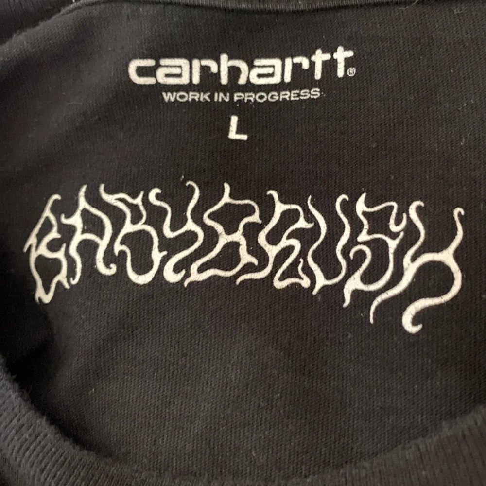 Carhartt Grin Long Sleeve T-Shirt with blue Flame Graphic, Size L​